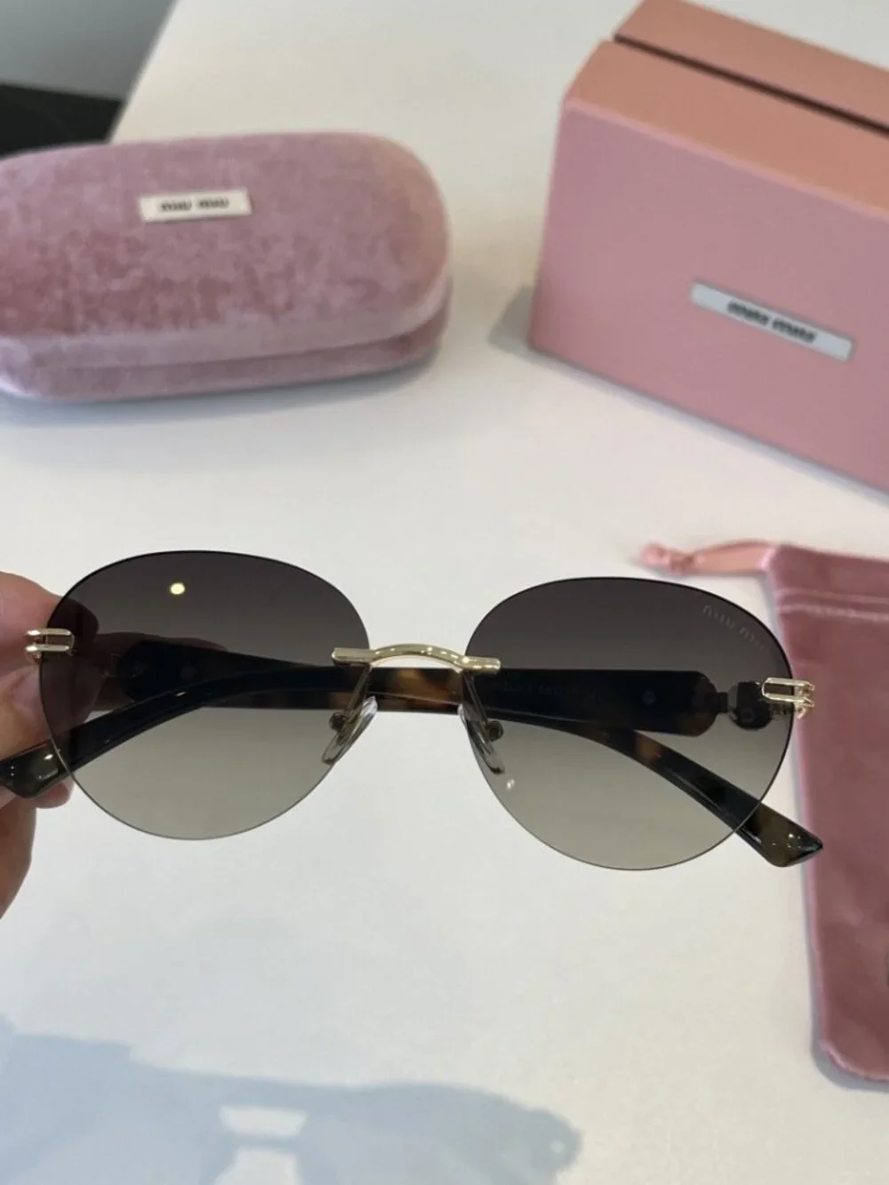 🥰Miu Miu🥰 Round, Rimless Light Gray Sunglasses